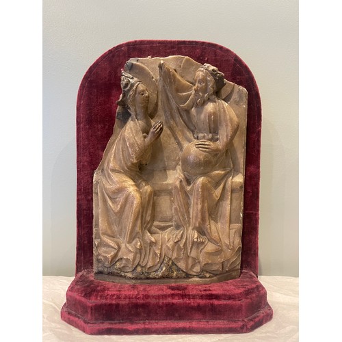 99 - A 15th century Nottingham alabaster panel sculpture. On burgundy velvet stand. Traces of original po... 