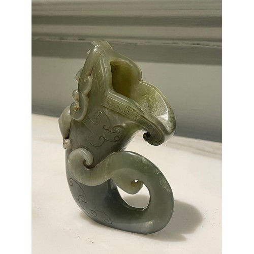 38 - An antique Chinese Jade Horn with a Climbing Dragon.Measurements:4.5 in (H) x 3 in (W)... 