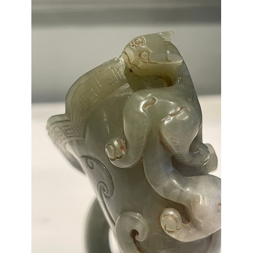 38 - An antique Chinese Jade Horn with a Climbing Dragon.Measurements:4.5 in (H) x 3 in (W)... 