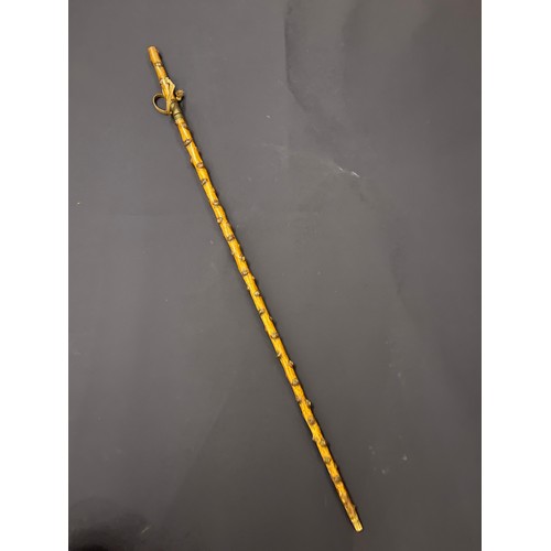 134 - 19th century sword stick. With a diamond blade in a knotted wood scabbard. Dimensions: In ... 