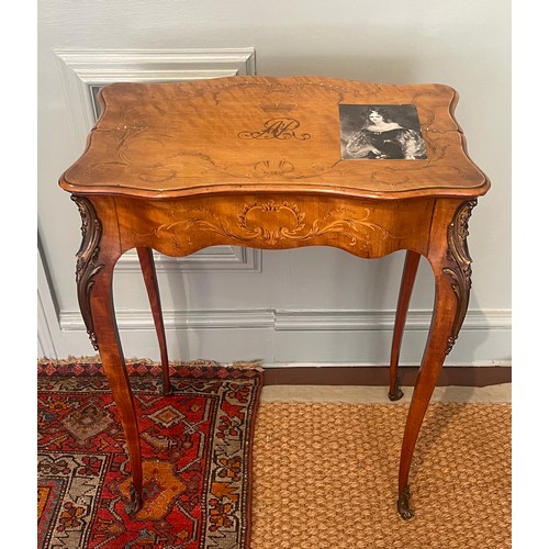 141 - Property of a Gentleman.A marquetry and ormolu table with monogram of Queen Adelaide of Saxe-Meining... 