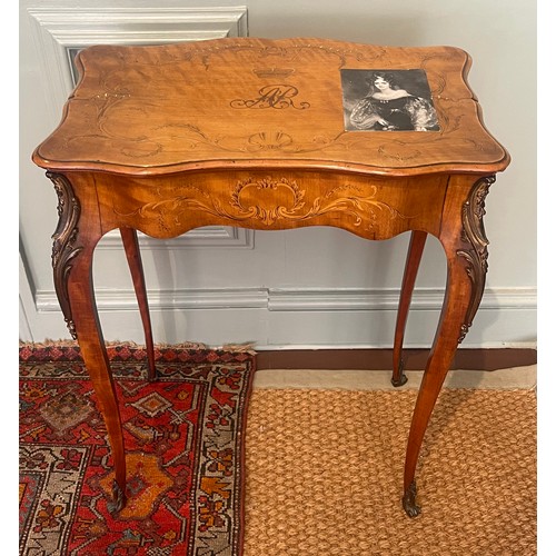 141 - Property of a Gentleman.A marquetry and ormolu table with monogram of Queen Adelaide of Saxe-Meining... 