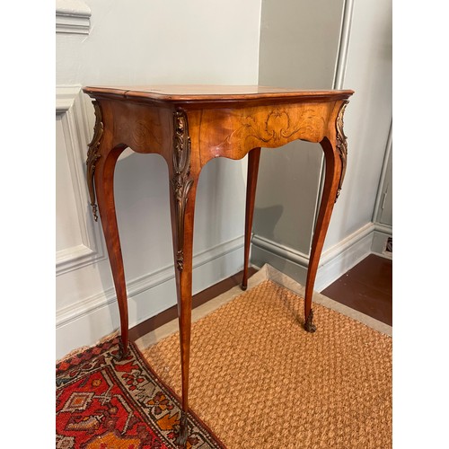 141 - Property of a Gentleman.A marquetry and ormolu table with monogram of Queen Adelaide of Saxe-Meining... 