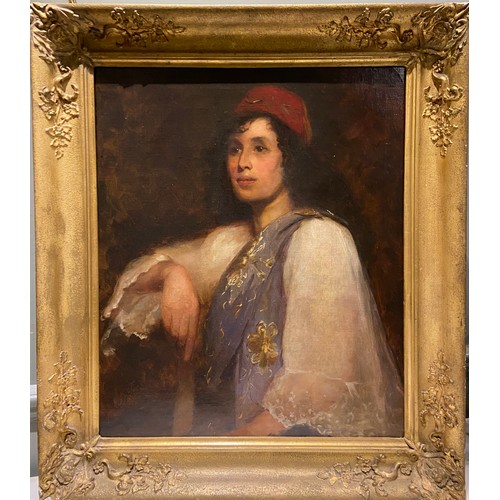 212 - A Portrait of an Greek Lady in a Red Hat. European School, mid-19th Century. Oil on canvas. In a gil... 