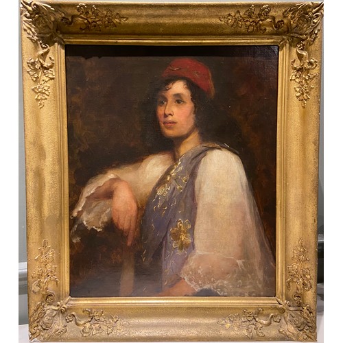 212 - A Portrait of an Greek Lady in a Red Hat. European School, mid-19th Century. Oil on canvas. In a gil... 