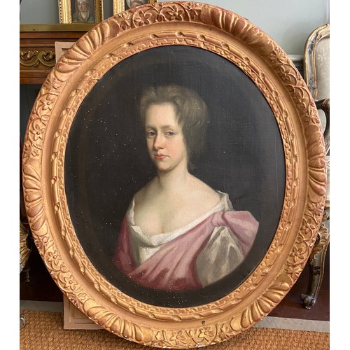 213 - Property of a GentlemanAn Oval Portrait of A Young Lady, British, 18th century. In a carved and gild... 