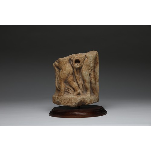 102 - A Roman marble statuary fragment of two figures and a theatrical mask carved in high relief. Pr... 