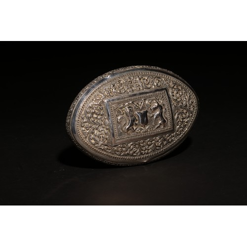 11 - A large antique South Asian ovoid silver casket.The top with a rectangular panel in which a stylised... 