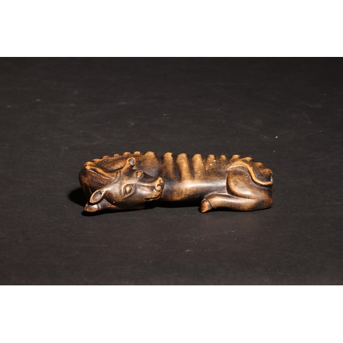 47 - A small carved wooden recumbent water buffalo.Chinese (?).Property of a Distinguished Gentleman of T... 