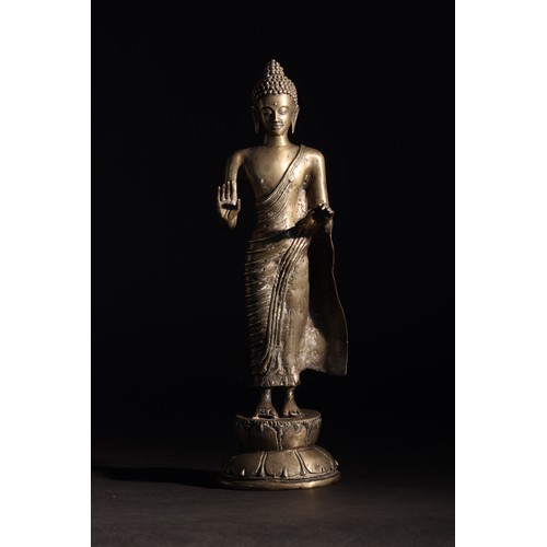 58 - South Asian.17th Century.Standing Buddha in a Teaching Position, On a Lotus.Cast metal.Property of a... 