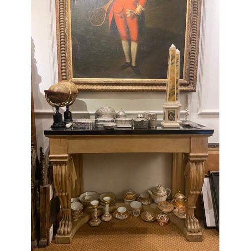 212 - 19th CenturyA pinewood console table with a later black stone top with feet carved into lion's paws.... 