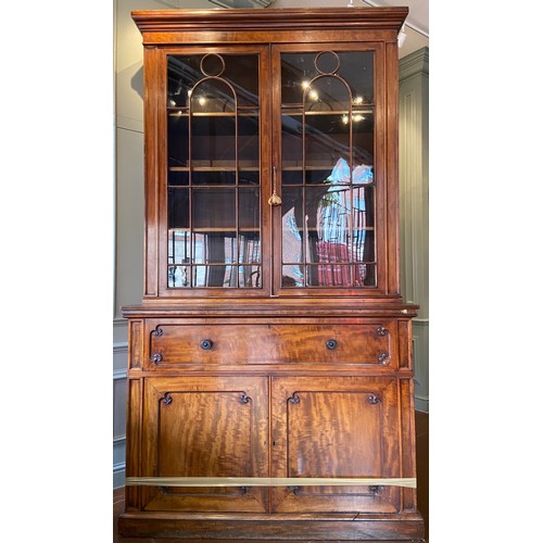 3 - Property of Sir Christopher OndaatjeLarge George IV mahogany secretaire bookcaseC. 1830Dimensions:10... 