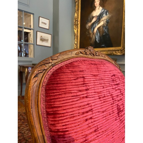 15 - Property of a ladyFrench18th CenturyA pair of Louis XV beechwood salon chairs Upholstered in crimson... 