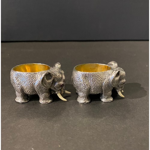 185 - A pair of Russian silver salts modelled as ElephantsBearing hall marks of Faberge: ‘ФАБЕРЖЕ&rs... 