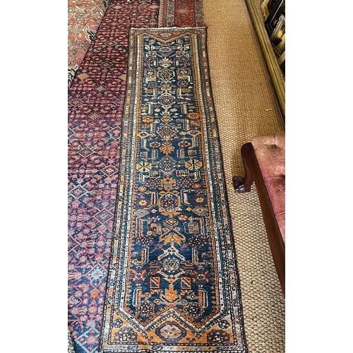 22 - Property of Sir Christopher OndaatjeHamdon Persian rugDimensions:8.7 ft. x 2.3 ft.... 