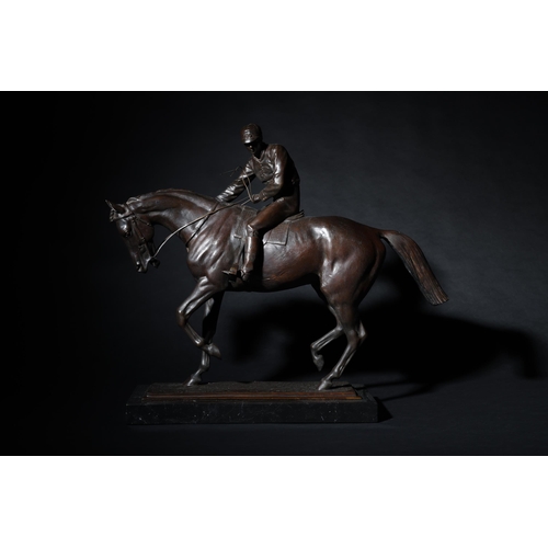 147 - To be sold without reserveProperty of Sir Christopher OndaatjeA bronze horse with jockeyOn a marble ... 