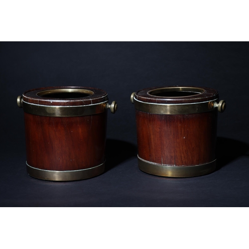 157 - Property of a gentlemanA pair of 18th century/early 19th century mahogany 'Chippendale' wine coolers... 