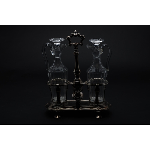 191 - Property of Sir Christopher Ondaatje20th centuryTwo jugs and stoppers with caddyDimensions:12 in. (H... 