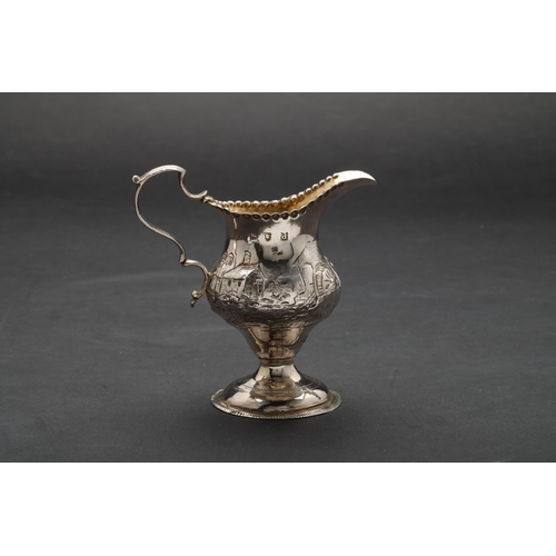 192 - Property of a ladyHester Bateman1779A George III silver cream-jug with gilt interiorOn a spreading f... 