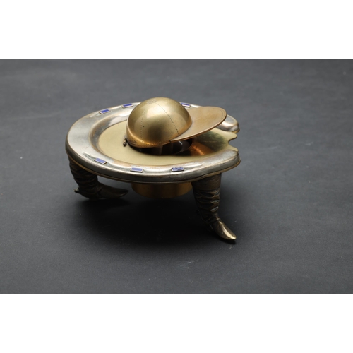 201 - 19/20th Century (?)Horse shoe ink well with jockey cap and spursDimensions:5 cm (H) x 12 cm (W)... 