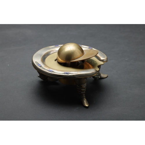 201 - 19/20th Century (?)Horse shoe ink well with jockey cap and spursDimensions:5 cm (H) x 12 cm (W)... 