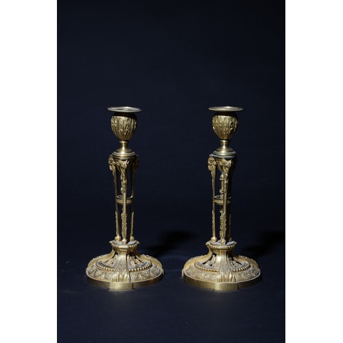 186 - Property of a ladyFrenchc. 1820A pair of Restauration ormolu candlesticksEach with a pierced tripart... 