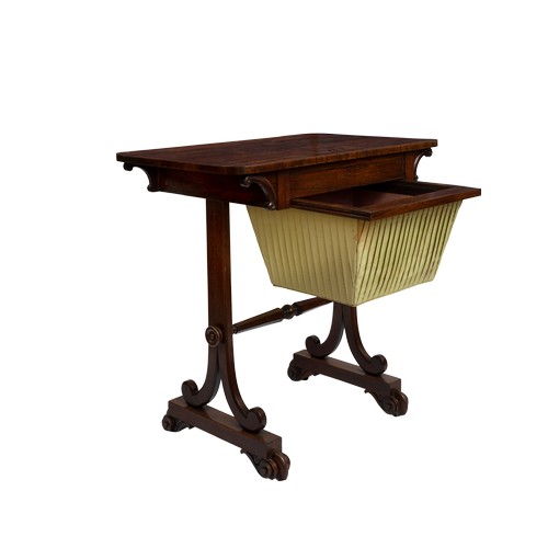 13 - Property of a ladyA Regency rosewood sewing tableWith a single drawer over a silk work-basket.Dimens... 