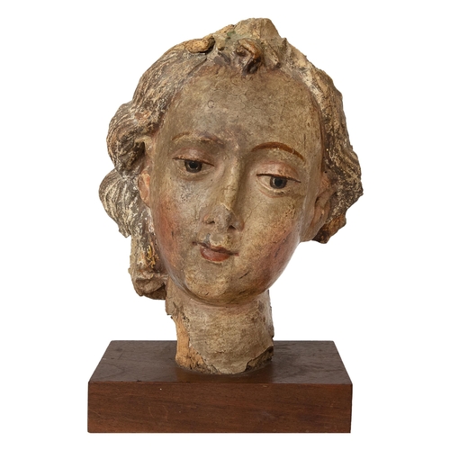 168 - Property of a GentlemanEuropean15th CenturyA carved head of an angel, original polychromeDimensions:... 