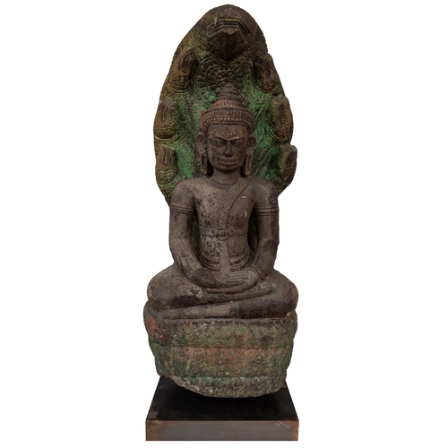 51 - Property of a GentlemanKhmer13th CenturyFigure of a seated Buddha Mucalinda (with traces of original... 