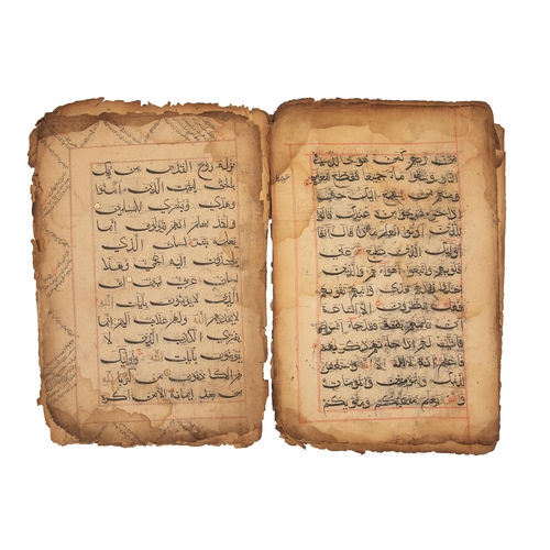 72 - Property of a GentlemanA selection of 107 Quranic manuscripts leaves, some with extensive marginalia... 