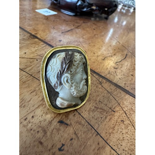 173 - Property of a Gentleman of Chelsea17th Century (?)A two-layered agate cameo of an emperor (?) laurea... 