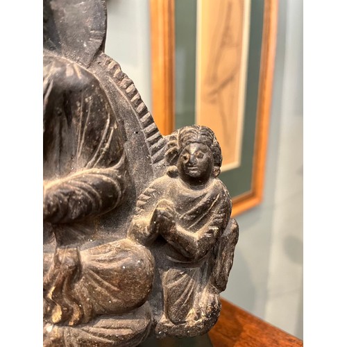 52 - Property of a Gentleman of ChelseaGandhara2nd Century ADA seated Buddha and devoteeDimensions:9 in. ... 