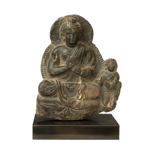 52 - Property of a Gentleman of ChelseaGandhara2nd Century ADA seated Buddha and devoteeDimensions:9 in. ... 