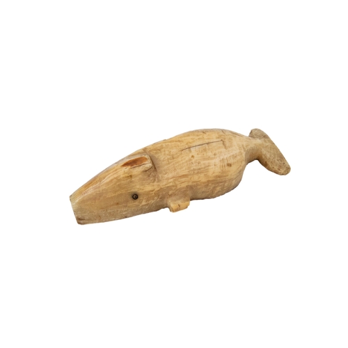 40 - Property of a gentlemanA group of 10 objects, including some of Inuit origin

a carved bone whistle ... 