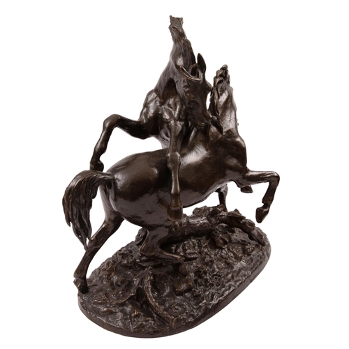 149 - Christophe Fratin (1801 - 1864)A pair of Arab stallions fighting (c. 1860)Bronze with brown patina a... 