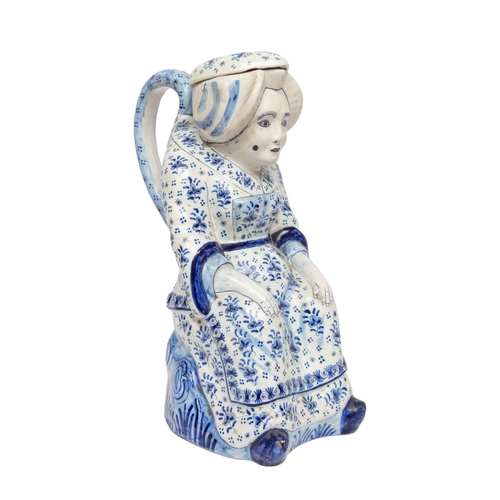 89 - Property of a Lady Delft18th CenturyA large pair of figural ceramic jugsPainted in colours and ... 