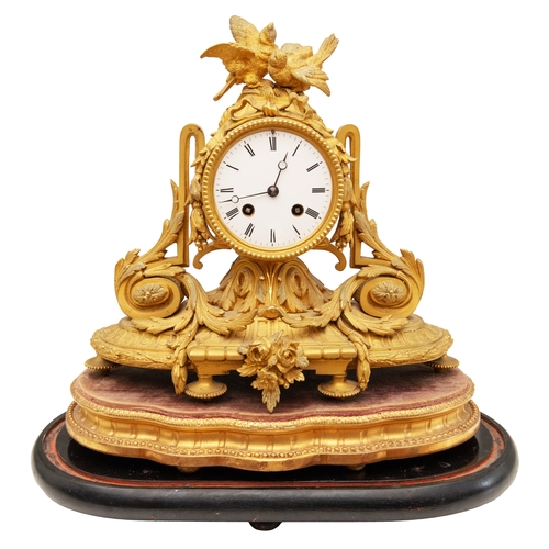 95 - Property of a GentlemanFrench19th CenturyA gilt bronze mantle clockOn an ebonised wood baseRecently ... 