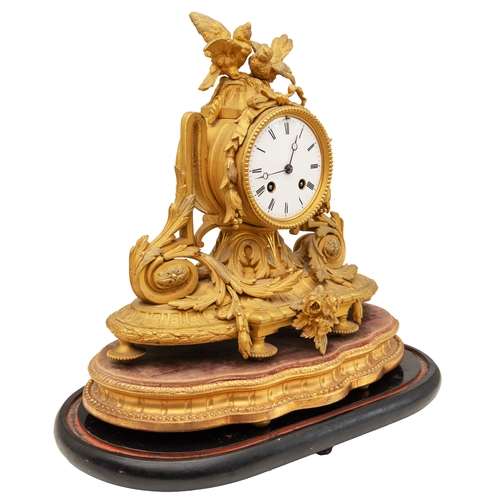 95 - Property of a GentlemanFrench19th CenturyA gilt bronze mantle clockOn an ebonised wood baseRecently ... 