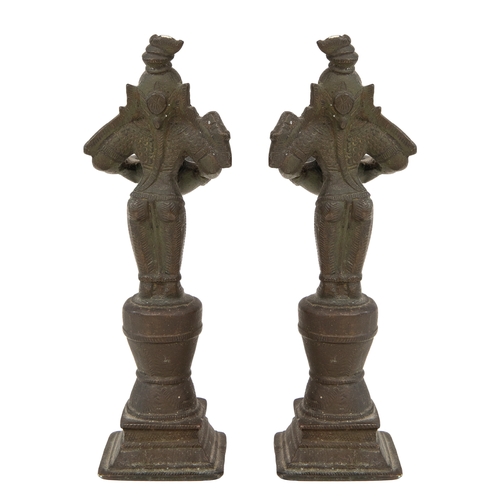 78A - Property of a LadyCentral IndianAntiqueThree bronze votive statues of deitiesA pair holding trays fo... 