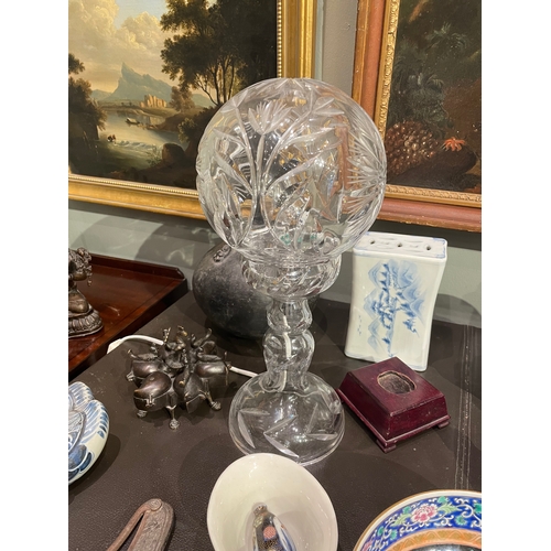 471 - To be sold without reserveProperty of a Lady20th Century

A bohemian cut crystal lamp;
A brass adjus... 