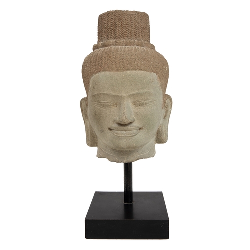 351 - Property of a LadyAntiqueThree stone Buddha headsTwo carved in the round, [1] one in a blue-grey sto... 