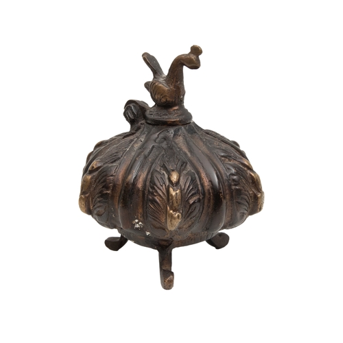 364 - To be sold without reserveProperty of a Lady

Middle Eastern, 20th Century, A cast metal p... 