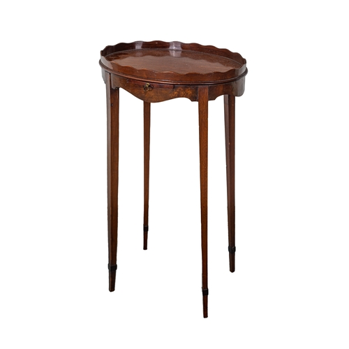 58 - To be sold without reserveProperty of a GentlemanAn antique small oval-top bedside table with a flat... 