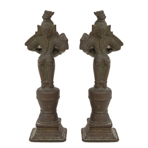 78A - Property of a LadyCentral IndianAntiqueThree bronze votive statues of deitiesA pair holding trays fo... 