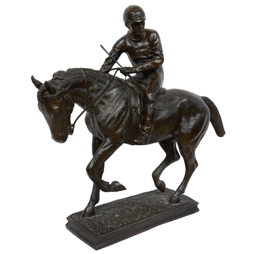 88 - Property of a Gentleman20th CenturyA large bronze of a jockey on horsebackCast bronzeDimensions:22 i... 