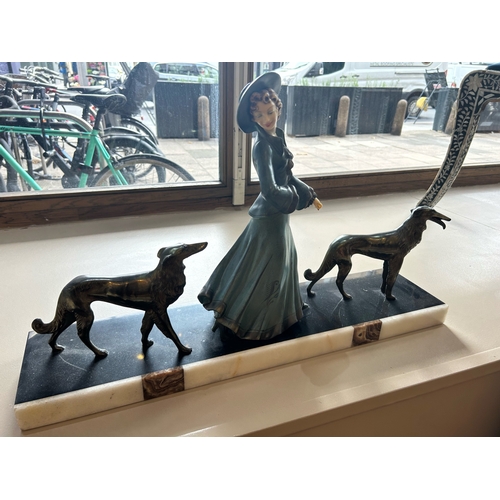 410 - To be sold without reserveProperty of a LadyArt DecoA figure with two borzoisBronze and porcelain&nb... 