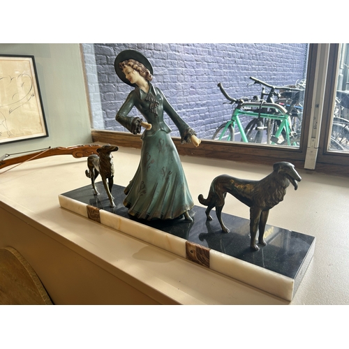 410 - To be sold without reserveProperty of a LadyArt DecoA figure with two borzoisBronze and porcelain&nb... 