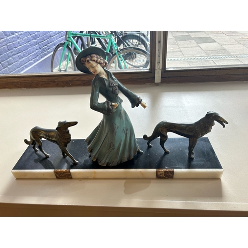 410 - To be sold without reserveProperty of a LadyArt DecoA figure with two borzoisBronze and porcelain&nb... 
