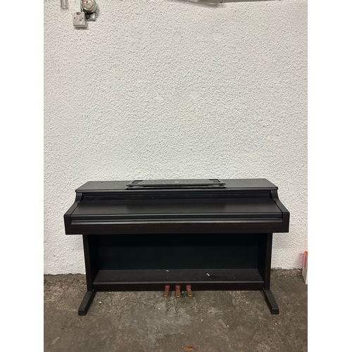 453 - To be sold without reserveProperty of a LadyYamahaA Clavinova electric home pianoWith a leather-upho... 