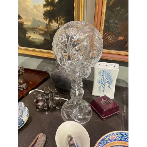 471 - To be sold without reserveProperty of a Lady20th Century

A bohemian cut crystal lamp;
A brass adjus... 